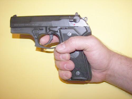 Beretta Cougar Pistol In A Shooting Grip