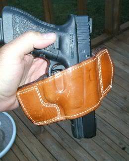GLOCK pistol in a slide holster