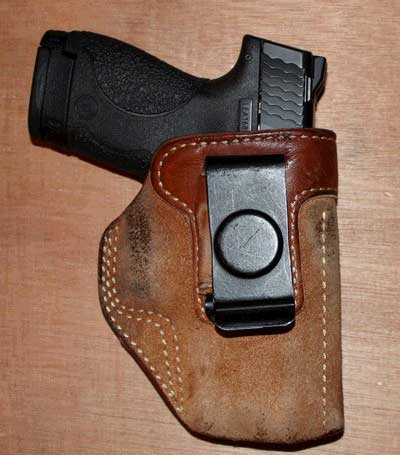 The Smith and Wesson 9mm Shield in an IWB holster made for a GLOCK
