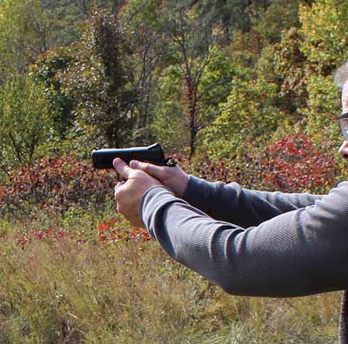 Two handed shooting grip on Para Expert Carry 1911 pistol