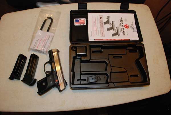 Ruger SR9C Compact Pistol Kit with case, magazines, and manual