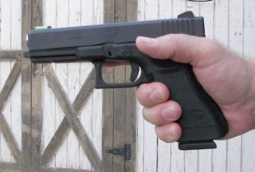 Starting Grip  with one hand on a pistol