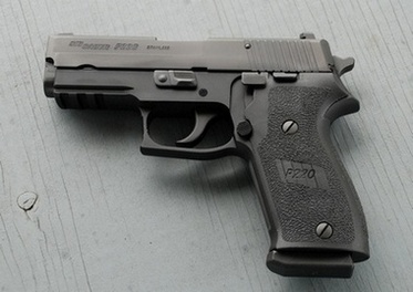 Sig P220 control side view